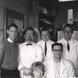J.C. Rabinowitz Research Group, 1963. Clockwise from front: Shirley Sunden, Ted Chase, Jesse Rabinowitz, Walter Lovenburg, Sam Raeburn (seated), Bob Buchanan. PHOTO: Courtesy of Bob Buchanan.