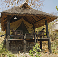 A hut in Gorongosa National Park. Reserves must accommodate and enrich the lives of people living in and near them, Wilson says. PHOTO: iStockphoto]