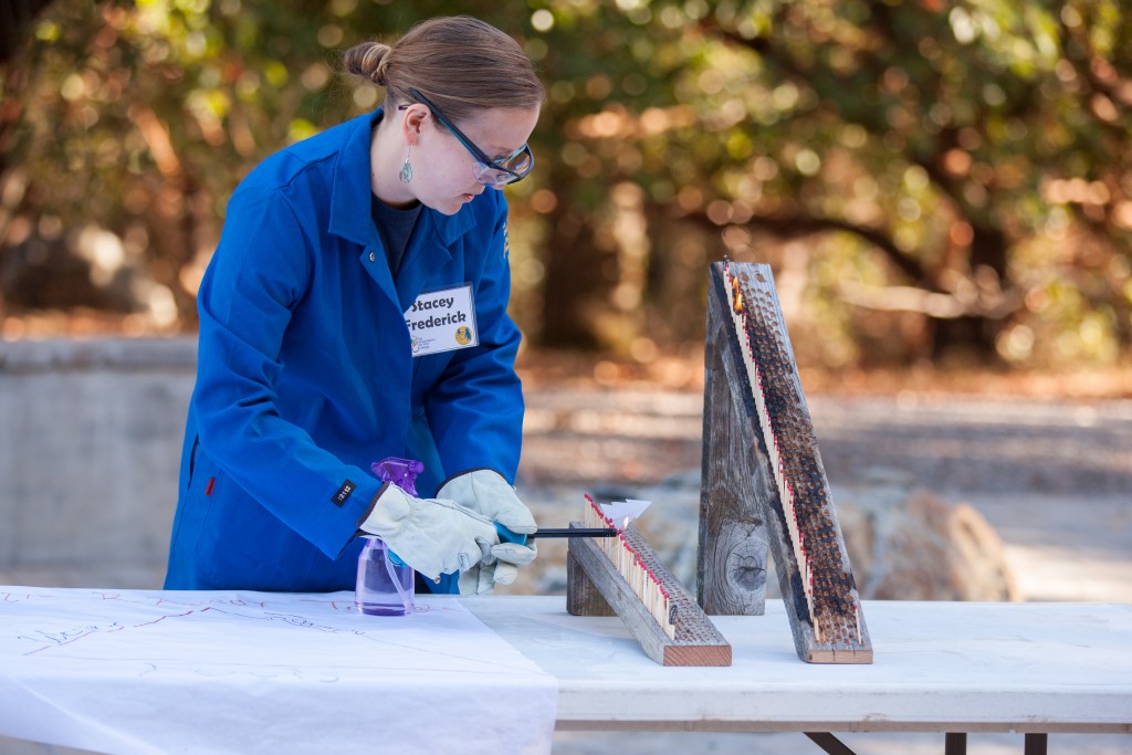 Stacey Frederick from the California Fire Science Consortium, demonstrates how topography can change the speed at which a fire spreads. Chris Pugh-Ukiah Daily Journal.