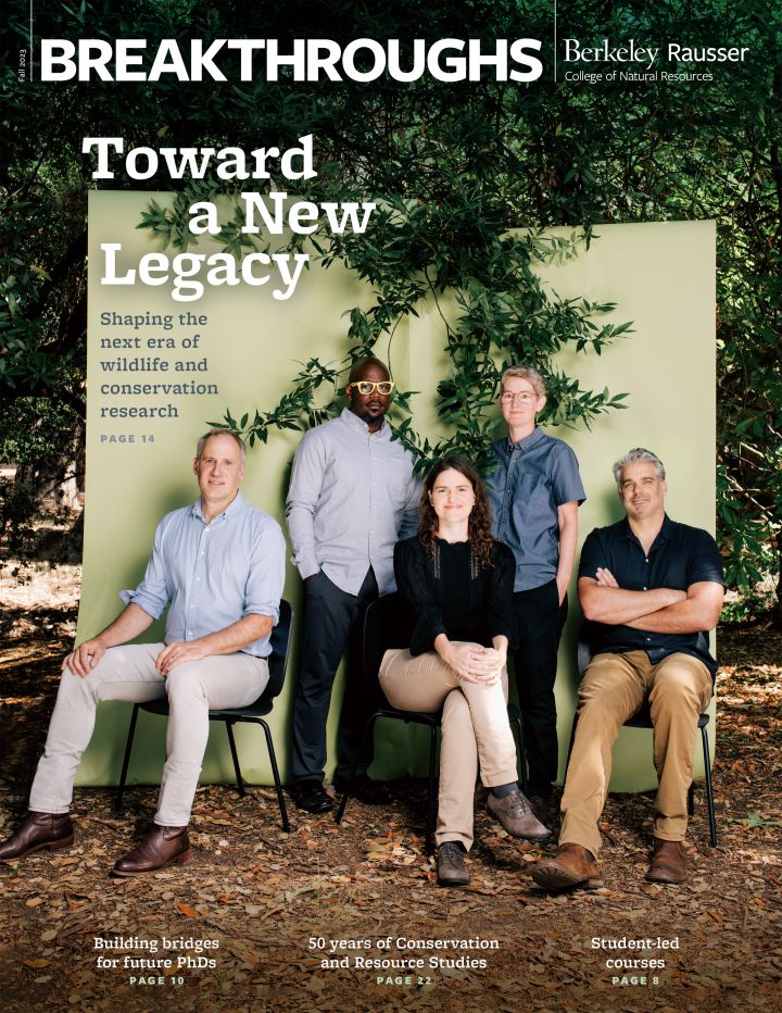 Cover of the fall 2023 Breakthroughs magazine: A group of people posed in a forest and the title "Toward a New Legacy"