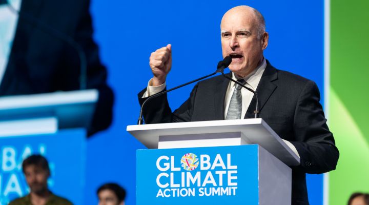 Jerry Brown speaking at a podium that says Global Climate Action