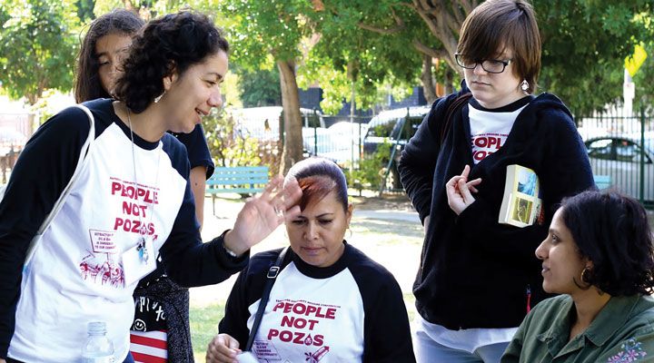 hamasunder (right) with South LA activists who campaigned against local oil and natural gas extraction.