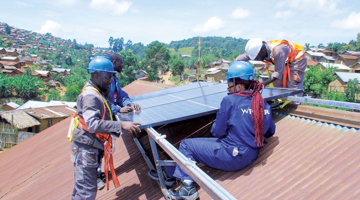 Technicians trained through the HETA project install solar panels on the roofs of facilities that UC Berkeley research identified as highest priority.