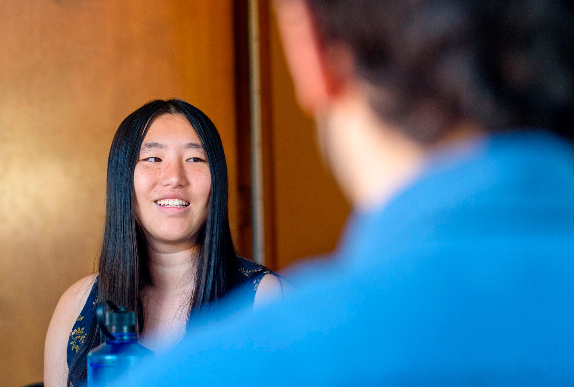 A student smiling