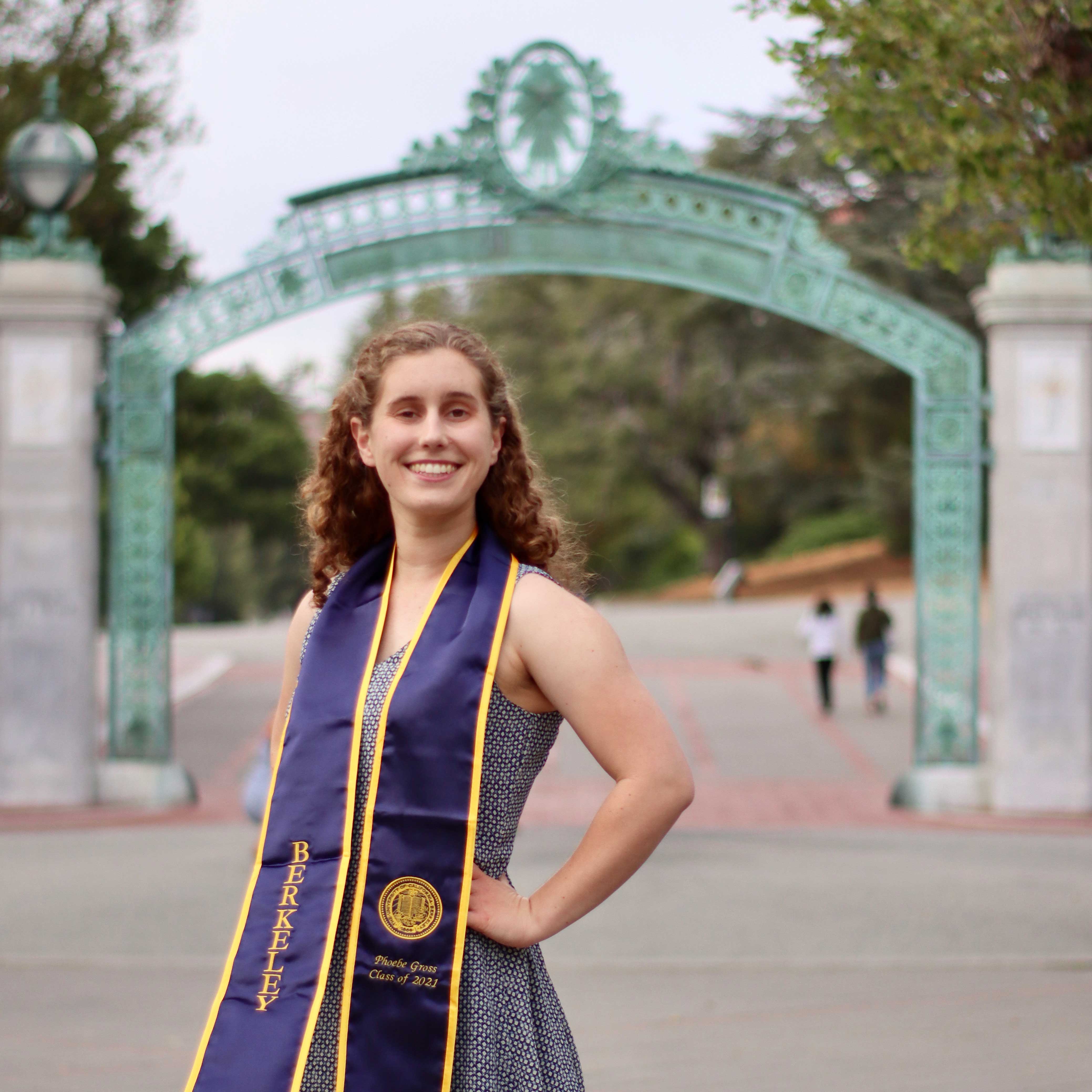 Phoebe Gross graduation photograph with Sather Gate