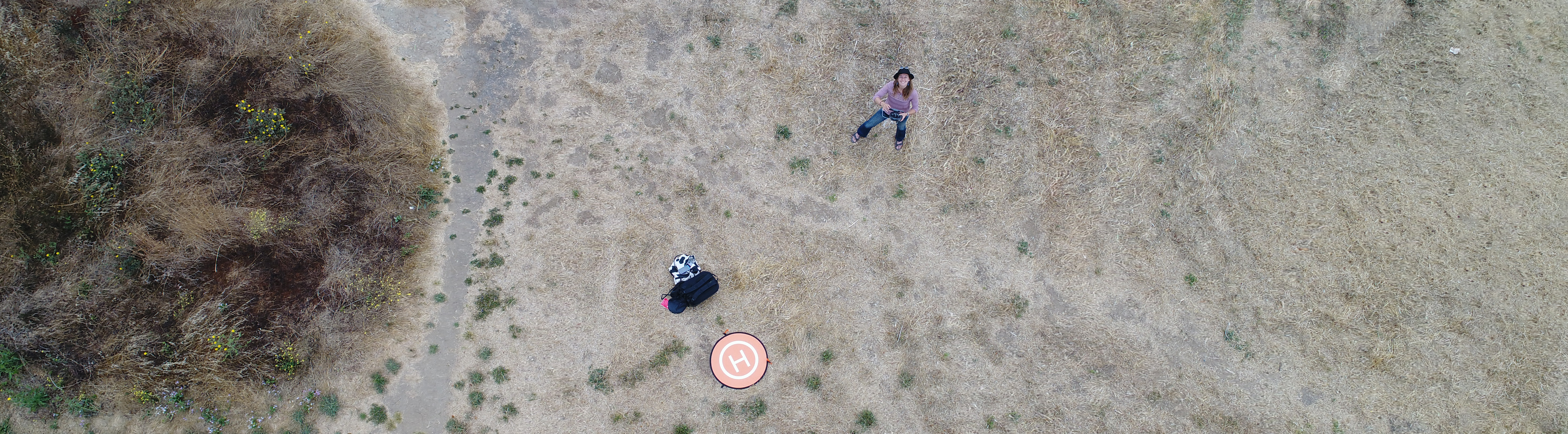 Chippie taking an aerial photo with her drone at Caesar Chavez Park in Berkeley, CA