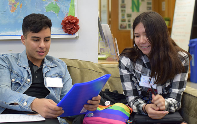 Two students discuss professional portfolios during an activity for How to Be A CNR Scientist