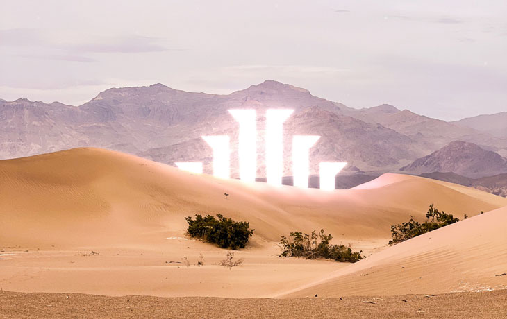 Image of artwork "Radiant Lands," photograph in Death Valley of pillars in the desert 