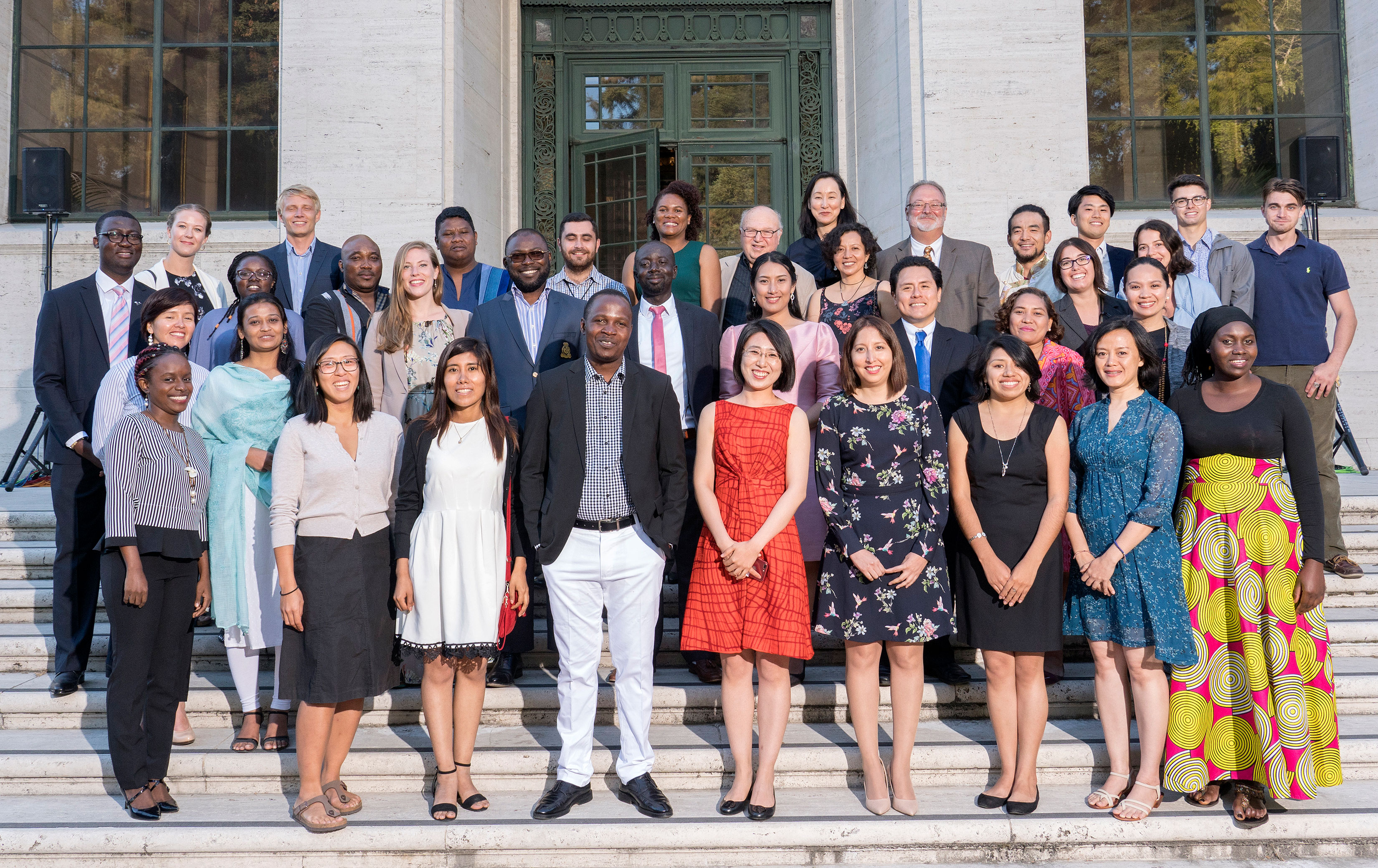 Group of ELP students standing on steps of Bancroft.