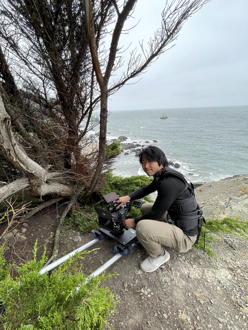 Steven Zeng behind the scene of a shot is Land End