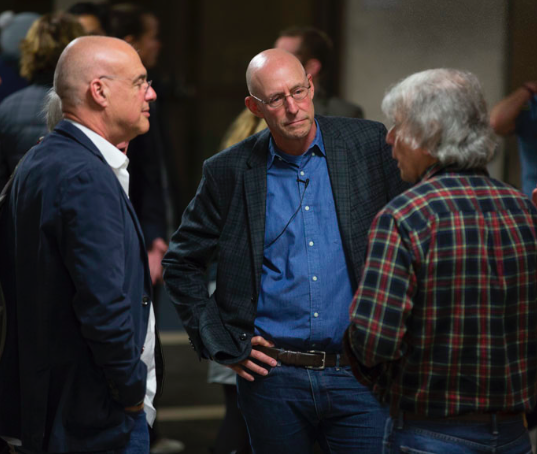 From left: Food writers Mark Bittman and Michael Pollan take with soil science professor Garrison Sposito Monday, Jan. 26, at the opening for the Edible Education course, now based at the College of Natural Resources. 