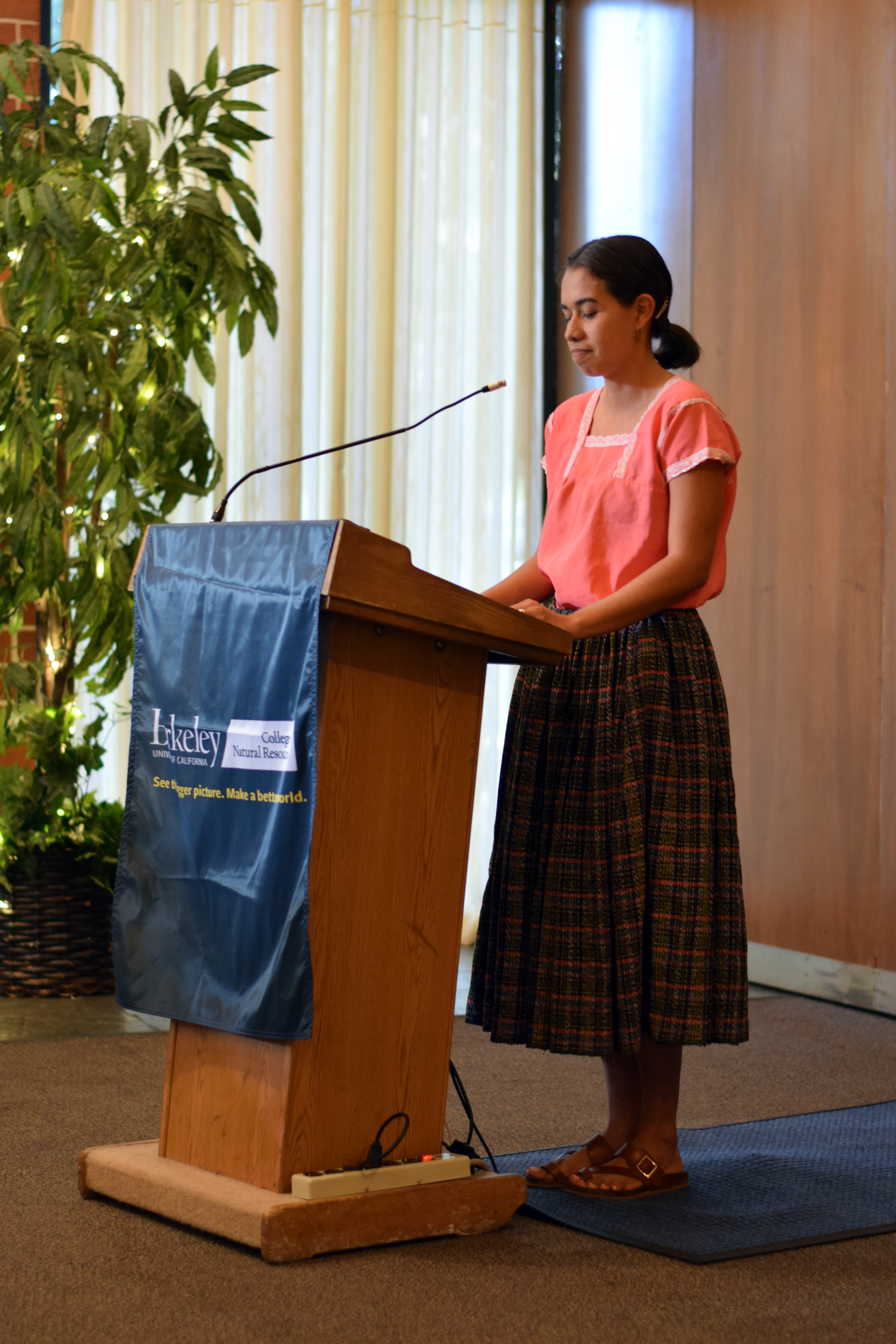 Photo of a woman speaking. 