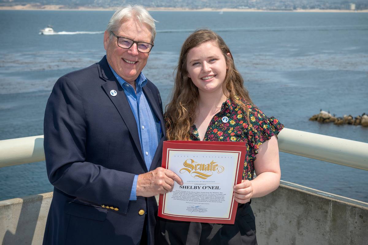 Shelby receiving a certificate from the Senate