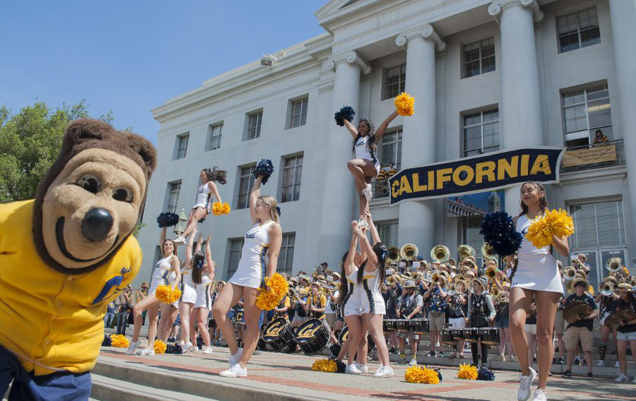 Oski the bear mascot and UC Berkeley cheerleaders