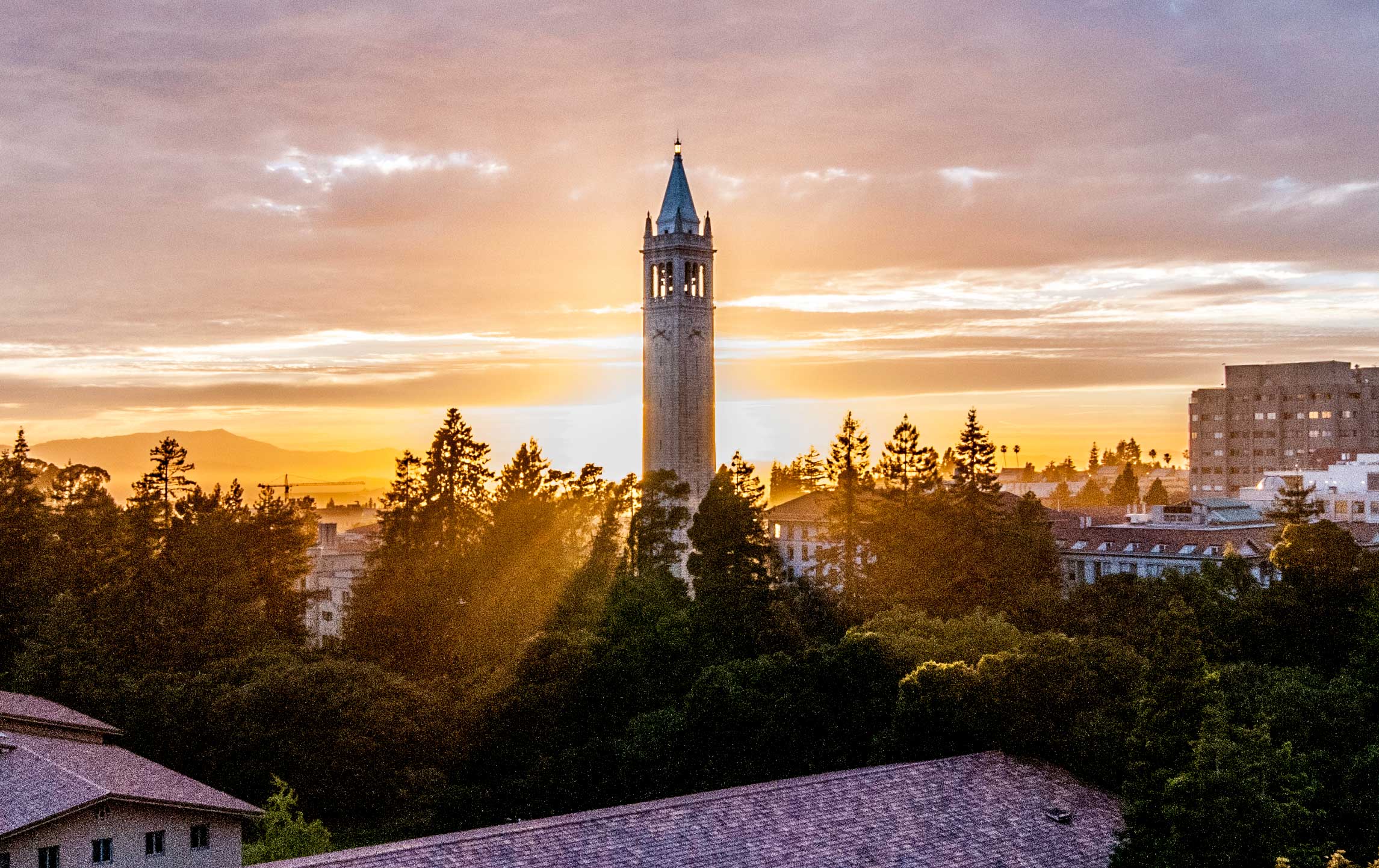 an aerial shot of the campanile and sunset