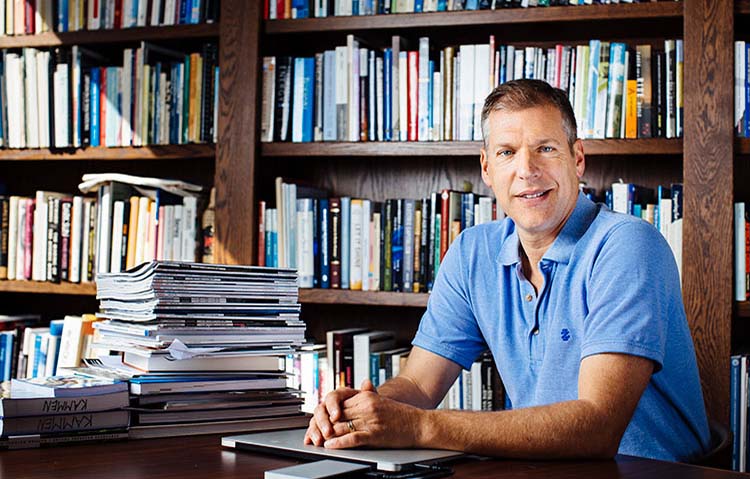 Image of Dan Kammen with library backdrop