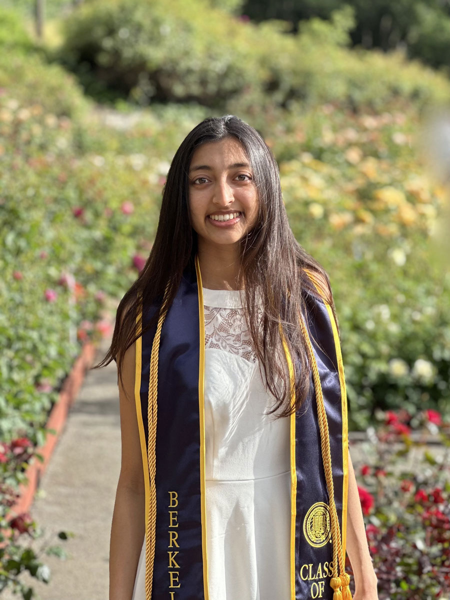 Image of Nikita wearing her graduation stole