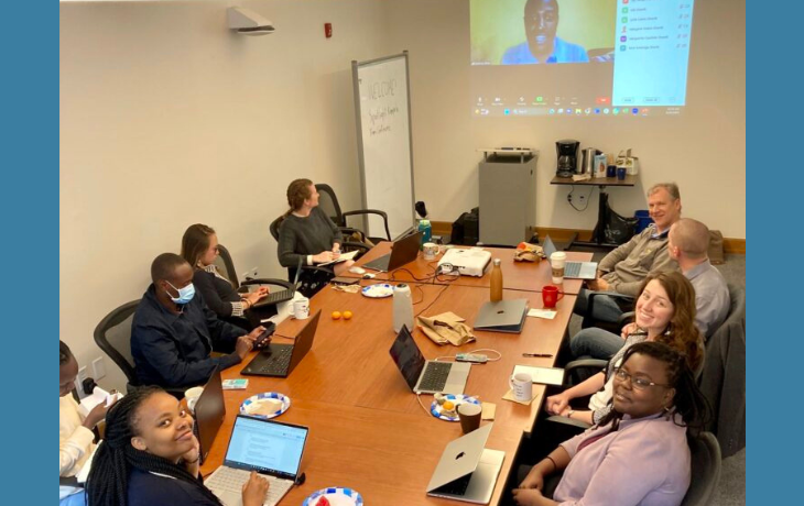 A group of people in a meeting room