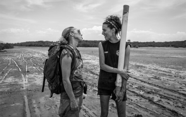 Ariane Arias-Ortiz (right) chats with colleague (left) during fieldwork for Blue Ventures. 