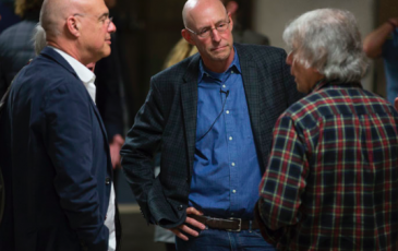 From left: Food writers Mark Bittman and Michael Pollan take with soil science professor Garrison Sposito Monday, Jan. 26, at the opening for the Edible Education course, now based at the College of Natural Resources. 