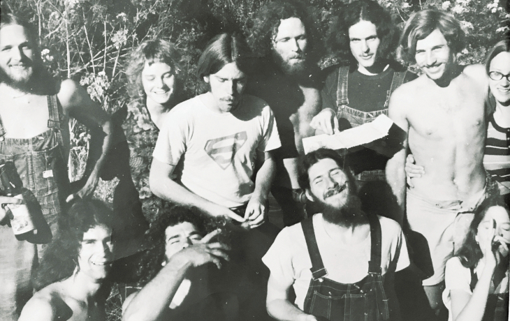 A black and white photo of a group of young people