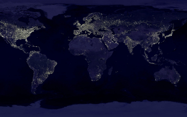 an aerial view of the earth lit up at night