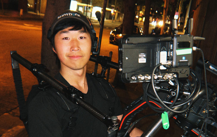 Thumbnail image of Steven holding up camera equipment 