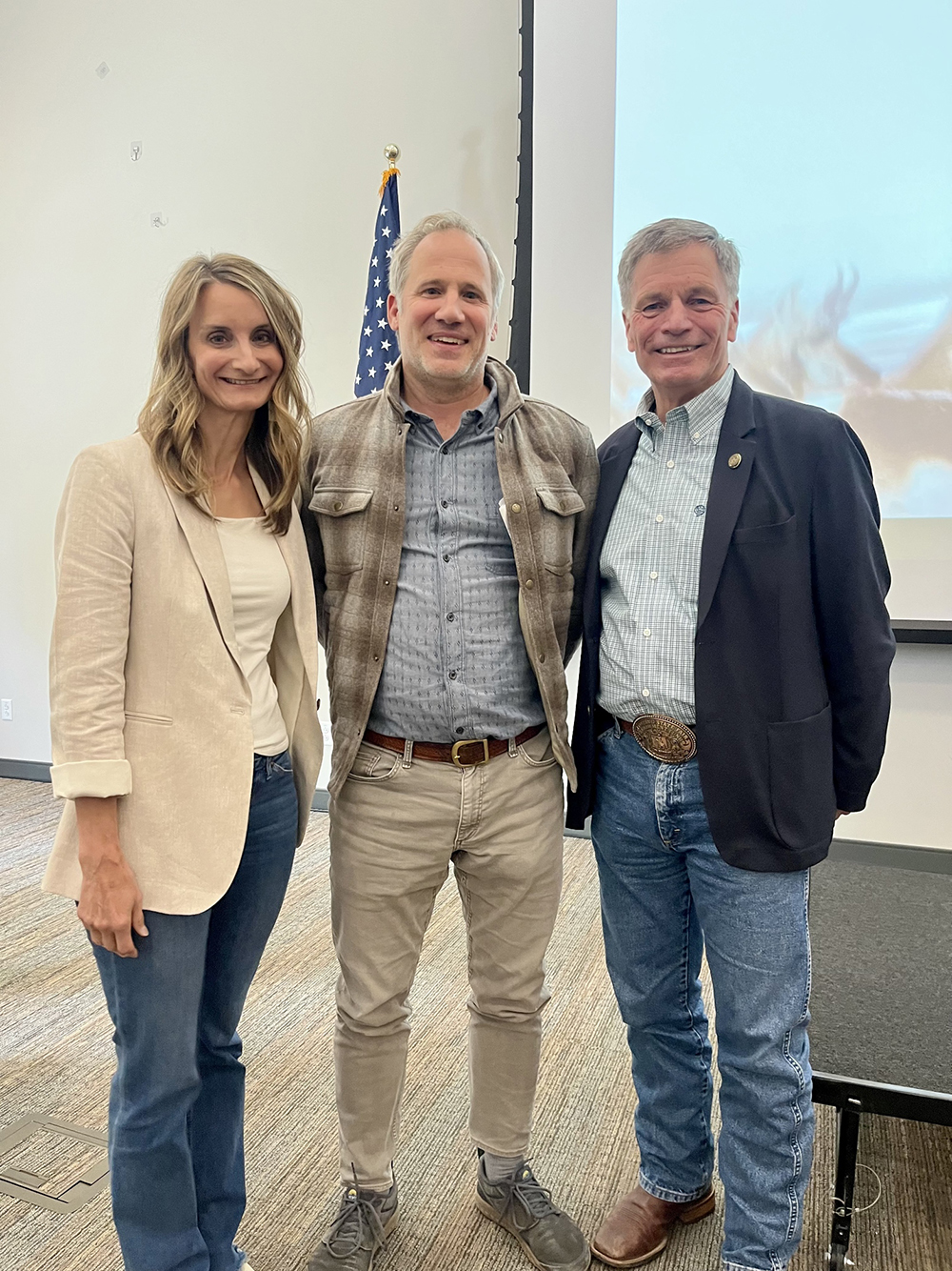 From right: Governor Mark Gordon, Arthur Middleton, and Angi Bruce, Director of the Wyoming Game and Fish Department. Credit: Laura Bell