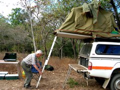 Plant the ladder firmly to support the tent.